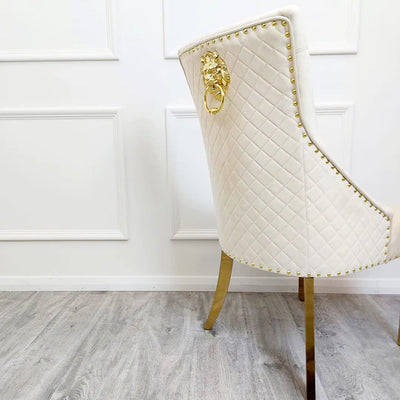 Louis Gold Marble & Chrome Dining Table With Gold Quilted Lion Knocker Velvet Chairs