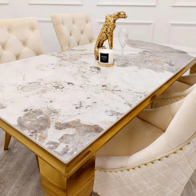 Louis Pandora Gold Marble Dining Table With Lucy Slim Quilted Gold Ring Knocker Velvet Chairs