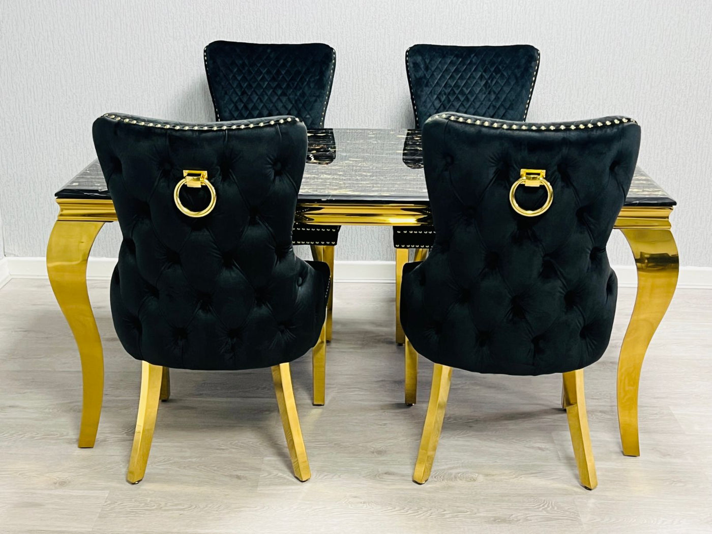 Louis Gold Black Marble Dining Table With Shimmer Black / Gold Ring Knocker Dining Chairs